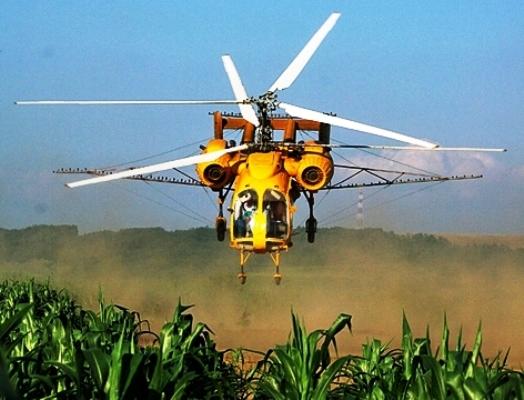 Услуги вертолета по обработке кукурузы
